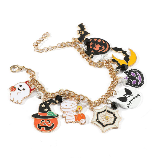 Combo bracelet featuring pumpkin, spider, bat, and ghost charms
