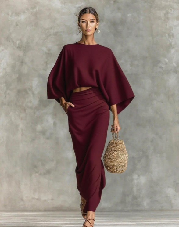 👗Midi Skirt Suit — high‑waisted skirt with round‑neck, long‑sleeved loose top for commuting