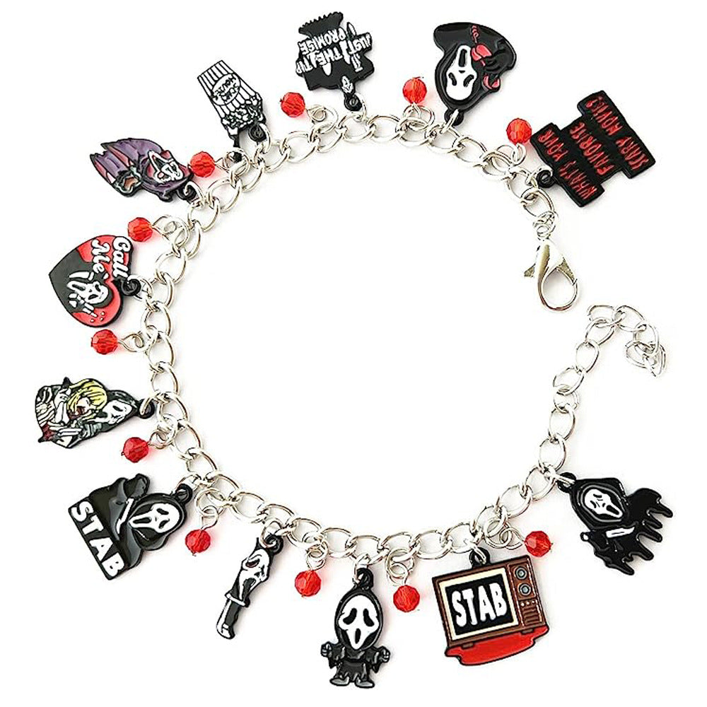 Combo bracelet featuring pumpkin, spider, bat, and ghost charms