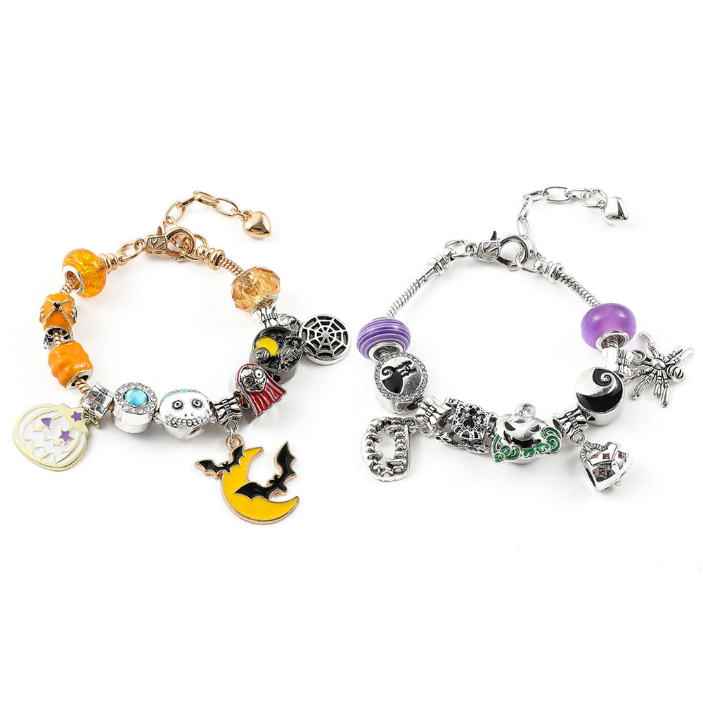 Combo bracelet featuring pumpkin, spider, bat, and ghost charms