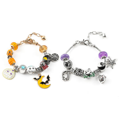 Combo bracelet featuring pumpkin, spider, bat, and ghost charms