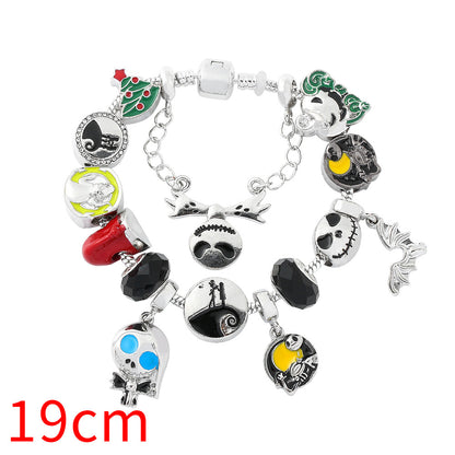 Combo bracelet featuring pumpkin, spider, bat, and ghost charms
