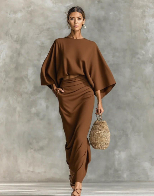 👗Midi Skirt Suit — high‑waisted skirt with round‑neck, long‑sleeved loose top for commuting