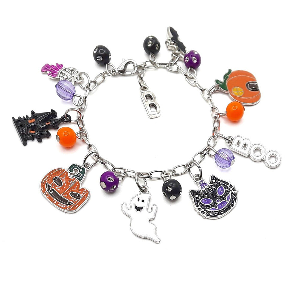 Combo bracelet featuring pumpkin, spider, bat, and ghost charms