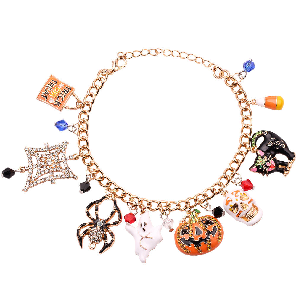 Combo bracelet featuring pumpkin, spider, bat, and ghost charms