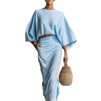 👗Midi Skirt Suit — high‑waisted skirt with round‑neck, long‑sleeved loose top for commuting