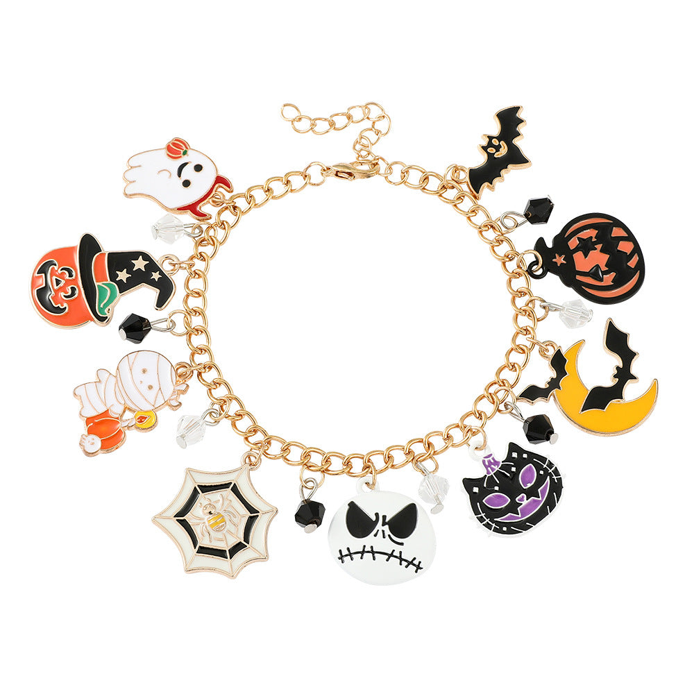 Combo bracelet featuring pumpkin, spider, bat, and ghost charms