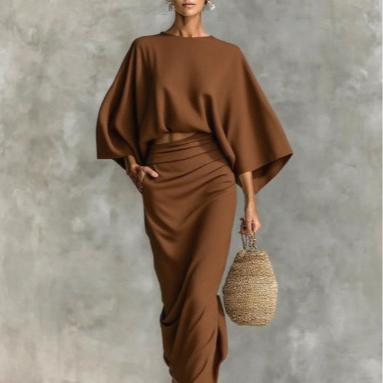 👗Midi Skirt Suit — high‑waisted skirt with round‑neck, long‑sleeved loose top for commuting