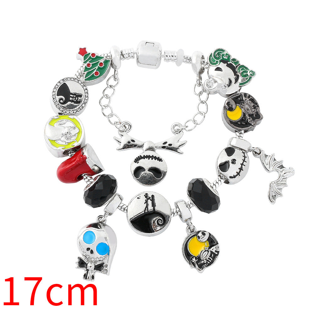 Combo bracelet featuring pumpkin, spider, bat, and ghost charms