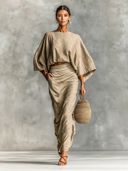 👗Midi Skirt Suit — high‑waisted skirt with round‑neck, long‑sleeved loose top for commuting