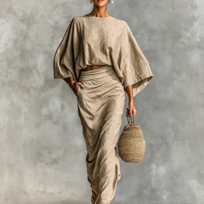 👗Midi Skirt Suit — high‑waisted skirt with round‑neck, long‑sleeved loose top for commuting