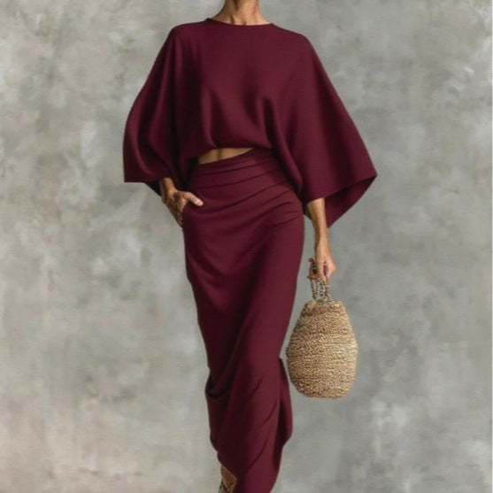 👗Midi Skirt Suit — high‑waisted skirt with round‑neck, long‑sleeved loose top for commuting