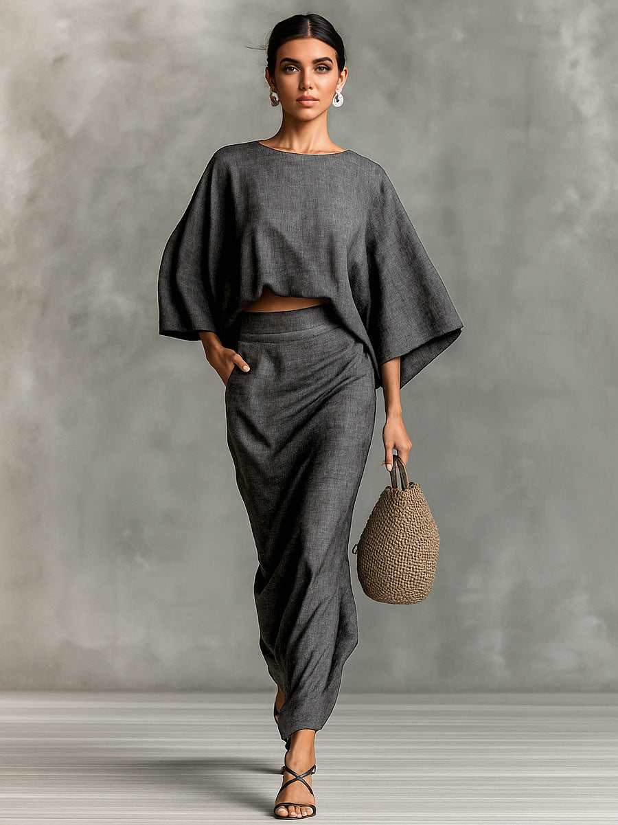 👗Midi Skirt Suit — high‑waisted skirt with round‑neck, long‑sleeved loose top for commuting