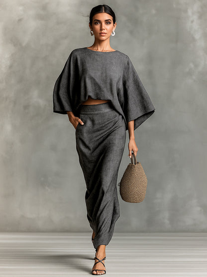 👗Midi Skirt Suit — high‑waisted skirt with round‑neck, long‑sleeved loose top for commuting