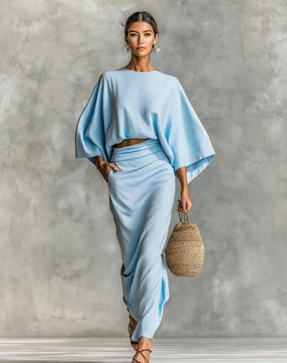 👗Midi Skirt Suit — high‑waisted skirt with round‑neck, long‑sleeved loose top for commuting