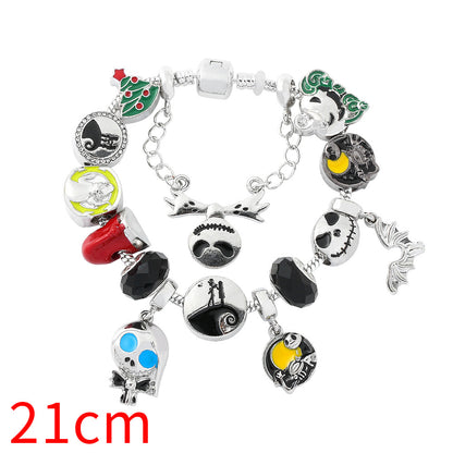 Combo bracelet featuring pumpkin, spider, bat, and ghost charms