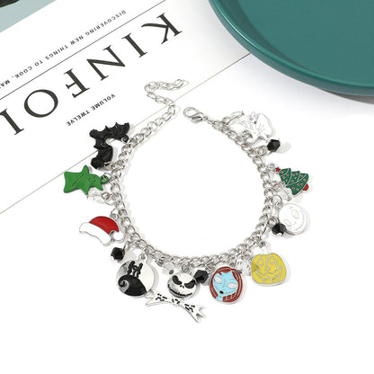 Combo bracelet featuring pumpkin, spider, bat, and ghost charms