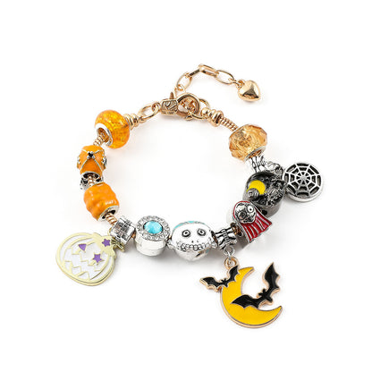 Combo bracelet featuring pumpkin, spider, bat, and ghost charms